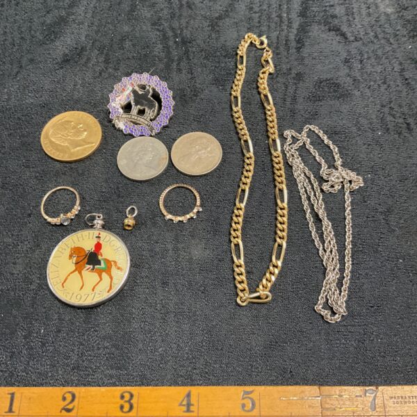 Mixed lot of vintage coins and gold plated chain jewellery.