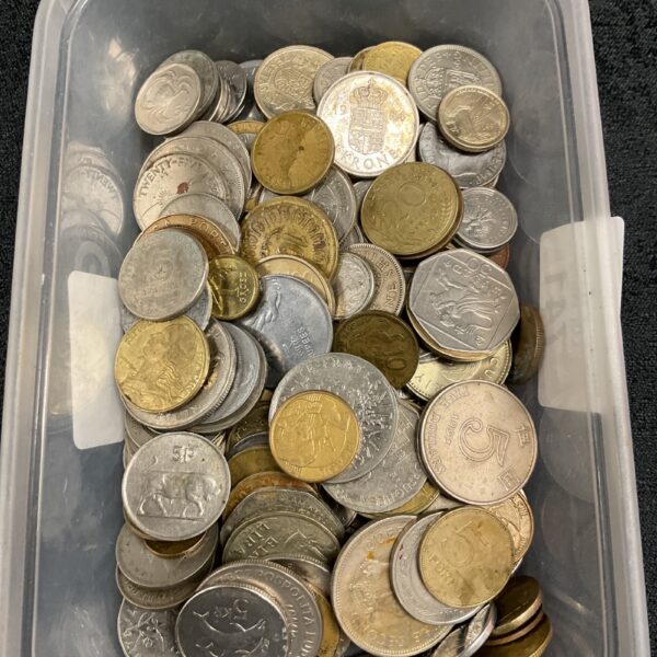 Assorted mixed coin lot with foreign currency and collectible coins.