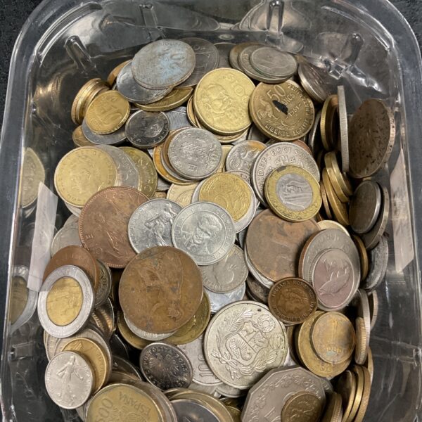 Bulk mixed coin lot with various world currencies.