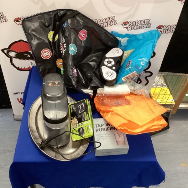 Mixed lot bundle including coffee machine, punch trainer, and blanket.