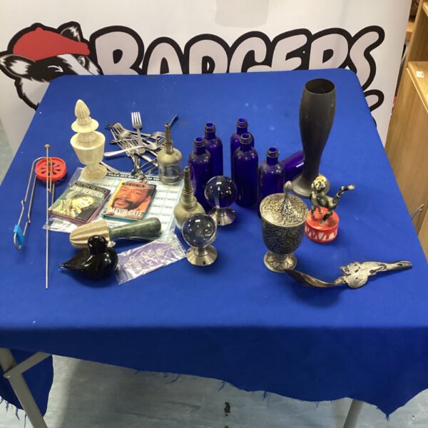 Mixed lot of vintage collectibles including blue glass bottles and club.