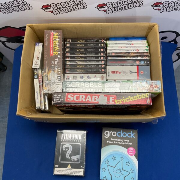 Mixed lot of games and DVDs including Scrabble and console games.