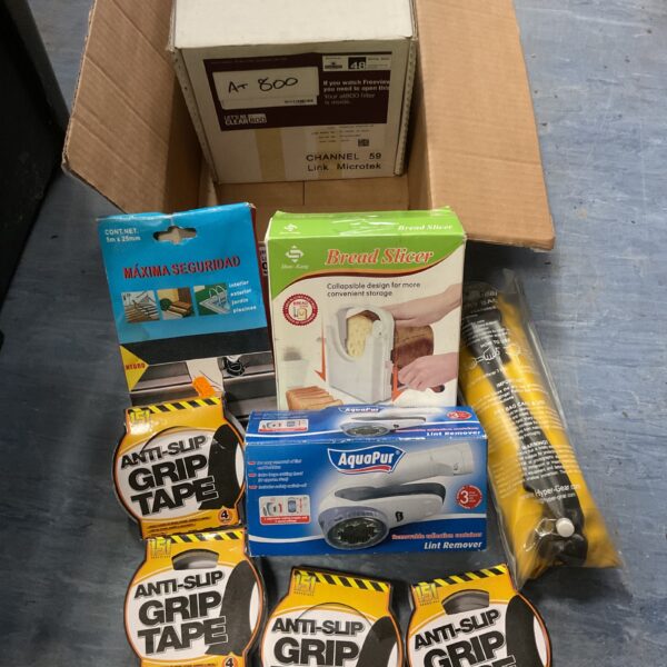 Mixed lot of household items including bread slicer and anti-slip tape.