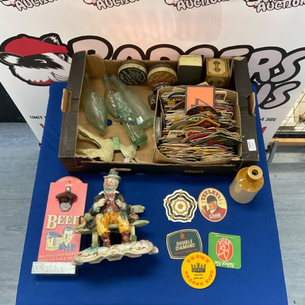 Vintage mixed lot of collectibles including glass bottles and a figurine.