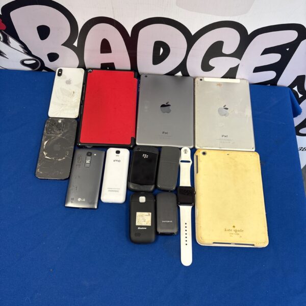 Mixed lot of used mobile phones and tablets for repair or collection.