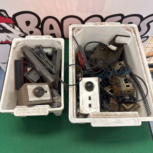Model railway items lot including controllers and accessories.