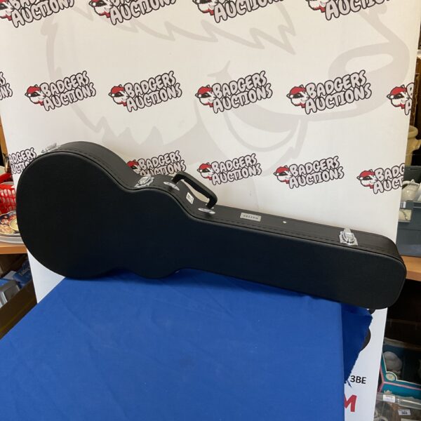 Black muztop guitar hard case with handle and locking mechanism.