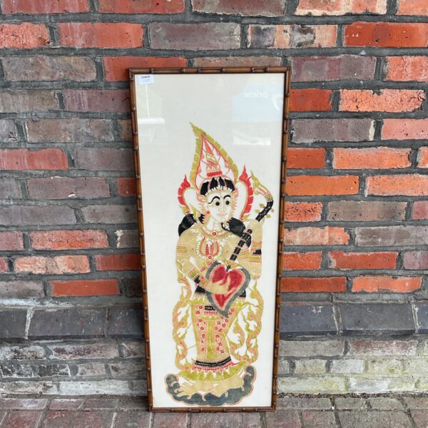 Intricate Thai Nang Yai shadow puppet art crafted from buffalo hide.