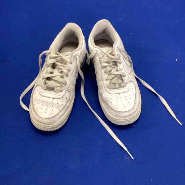 White size 6 Nike Air Force 1 trainers, classic sportswear.