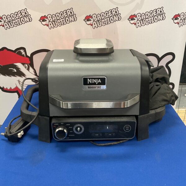 Front view of the Ninja Woodfire Oven, a digital kitchen appliance.