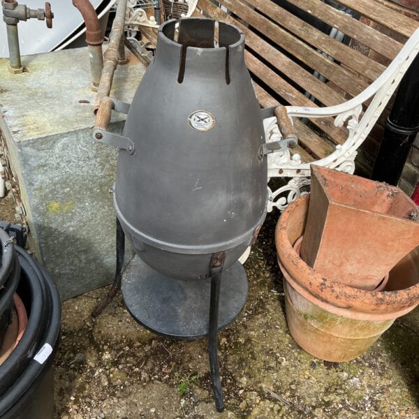 Vintage Nippori combination cooker, cast iron stove for outdoor cooking.