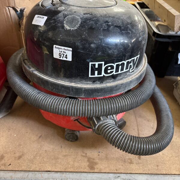 Red Numatic Henry 110v vacuum cleaner in used condition.