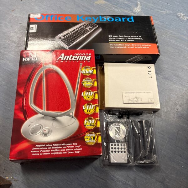Vintage office keyboard with antenna and scan radio set.