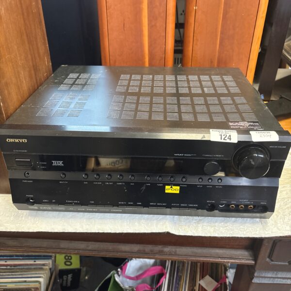 Black Onkyo TX-SR706 AV receiver for home theater surround sound.