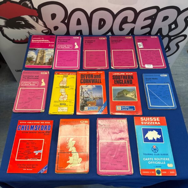 Vintage Ordnance Survey maps collection showing detailed UK topography.