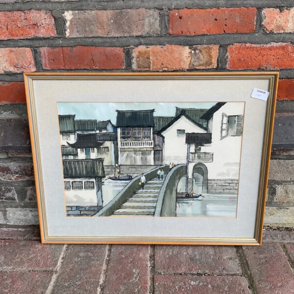 Traditional oriental townscape painting with figures on a bridge.
