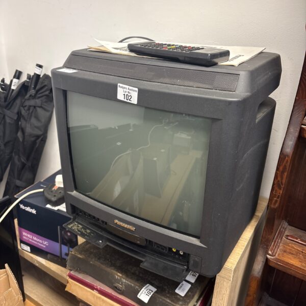 Vintage Panasonic CRT television TX-15M1T with remote control.