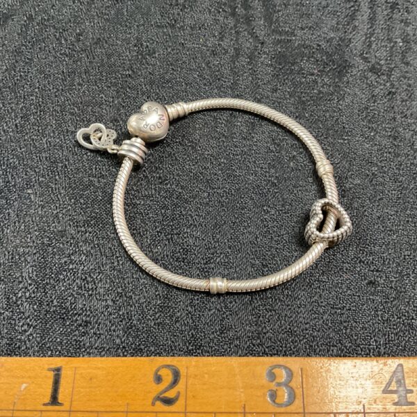 Pandora silver heart charm bracelet, delicate silver jewellery.