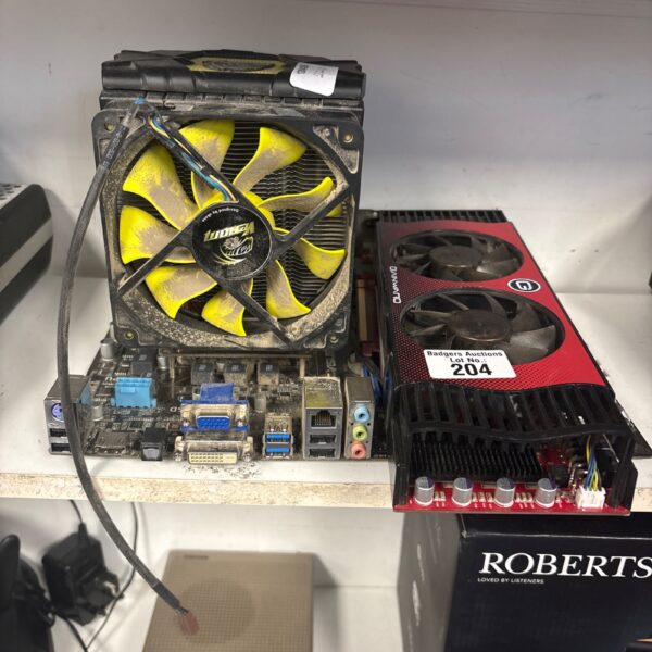 Used PC components lot with motherboard and graphics card.