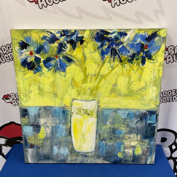 Vibrant oil painting of a yellow vase with blue flowers by Penny Rees.