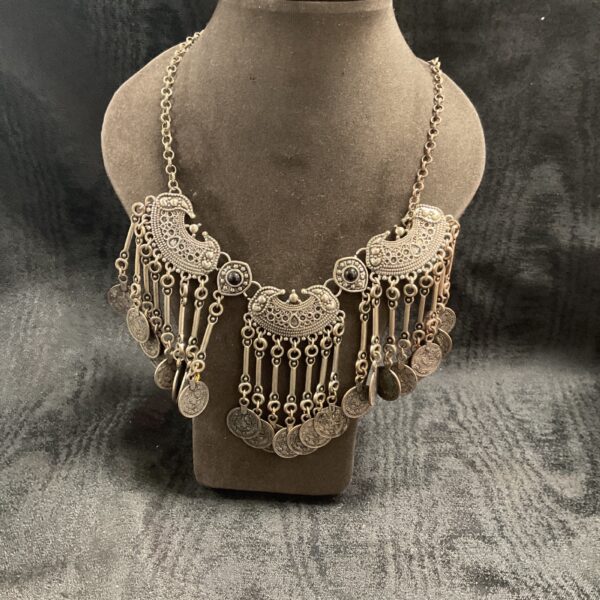 Vintage Persian coin necklace with detailed medallions.