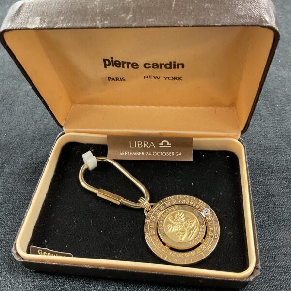 Vintage Pierre Cardin Libra star sign keyring, gold tone.