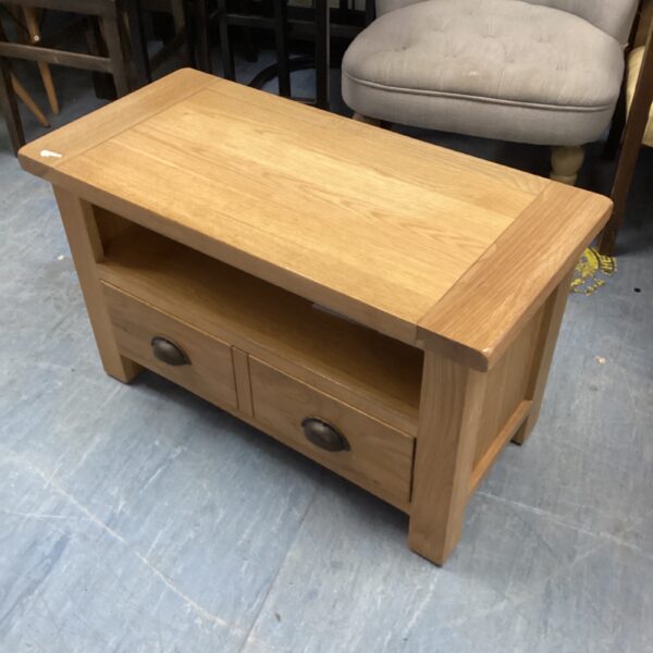 Rustic pine coffee table with two drawers for living room storage.