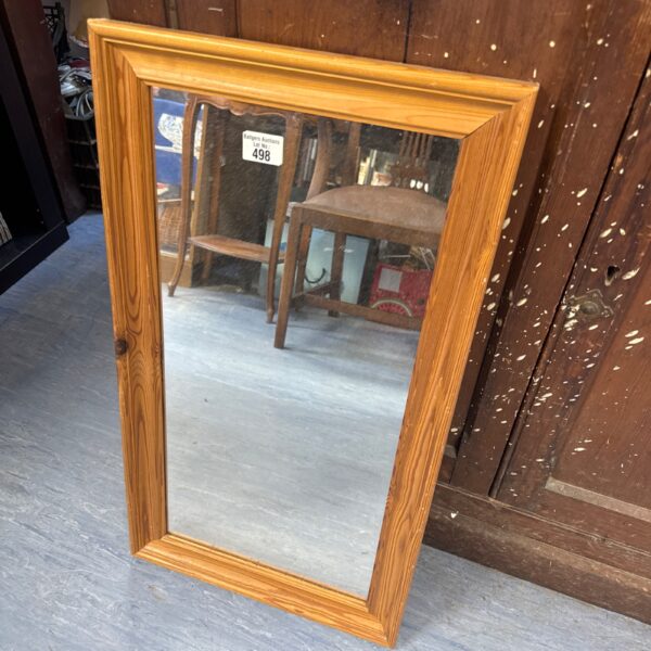 Vintage pine framed mirror for rustic wall decor.