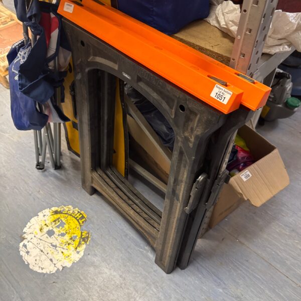 Pair of used plastic folding trestles for events or DIY.