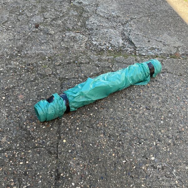 Close-up of a rolled plastic sheeting for garden or DIY projects.