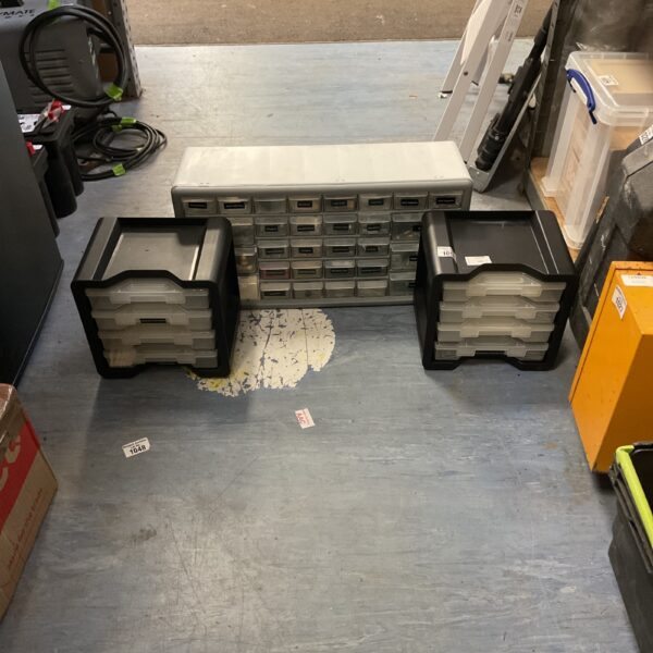 Lot of two plastic storage cabinets for workshop organization.