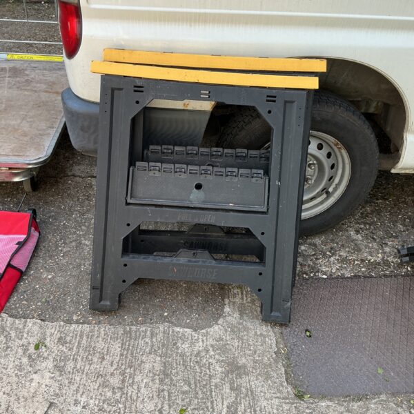 Set of used plastic work trestles for DIY projects.