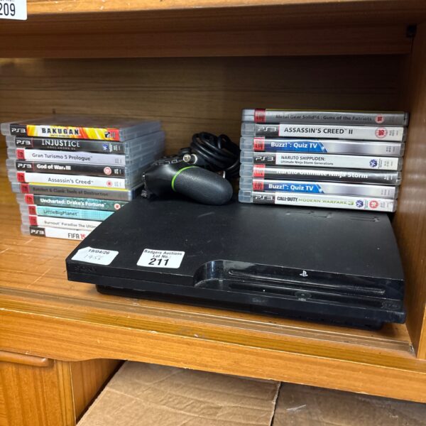 Sony PlayStation 3 console with games and controller for sale.
