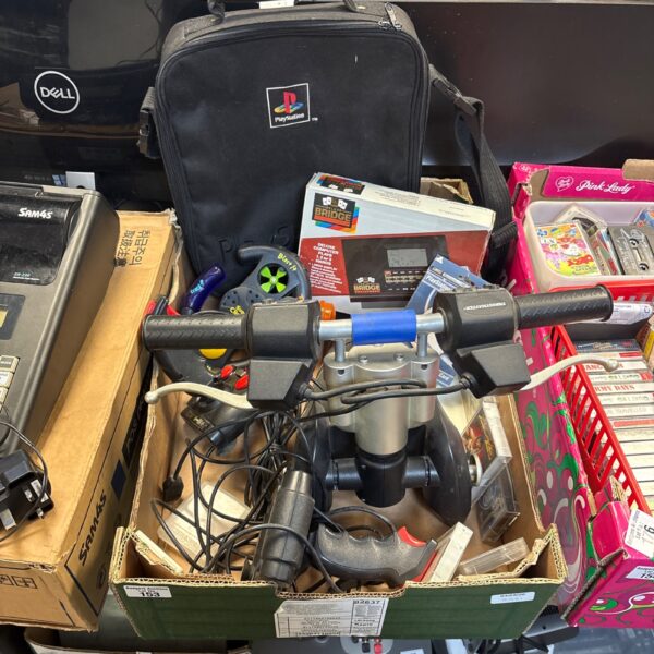 Black PlayStation carry bag with gaming accessories inside.