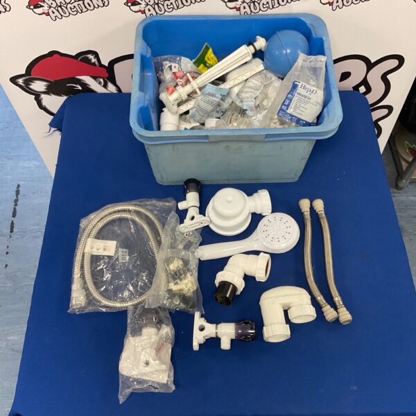 Mixed lot of plumbing fittings with shower head and taps.
