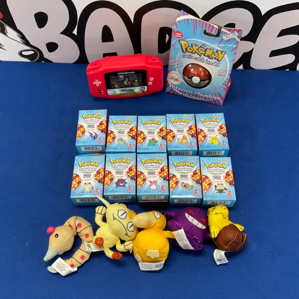 Pokémon collectibles lot with figures, toys, and Geodude.