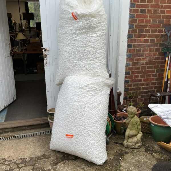 Large bags of polystyrene packaging chippings for protective void fill.