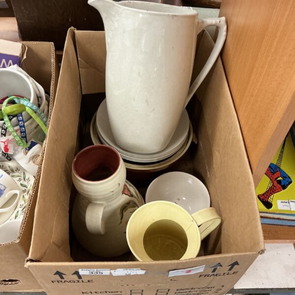 Vintage porcelain collectibles lot with floral vase and ceramics.