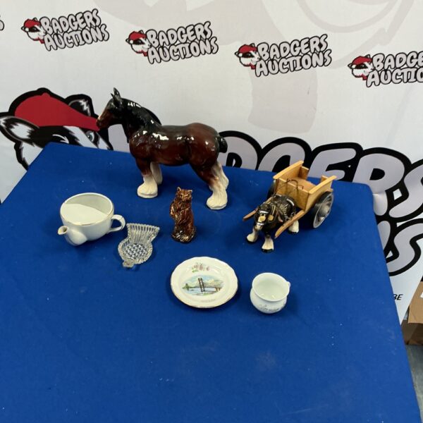 Porcelain Shire horse figurine with floral cups and saucers.