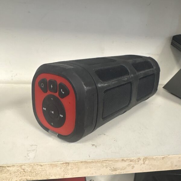 Red portable Bluetooth speaker with control buttons.