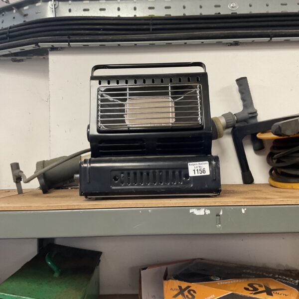 Front view of a portable butane heater for outdoor use.