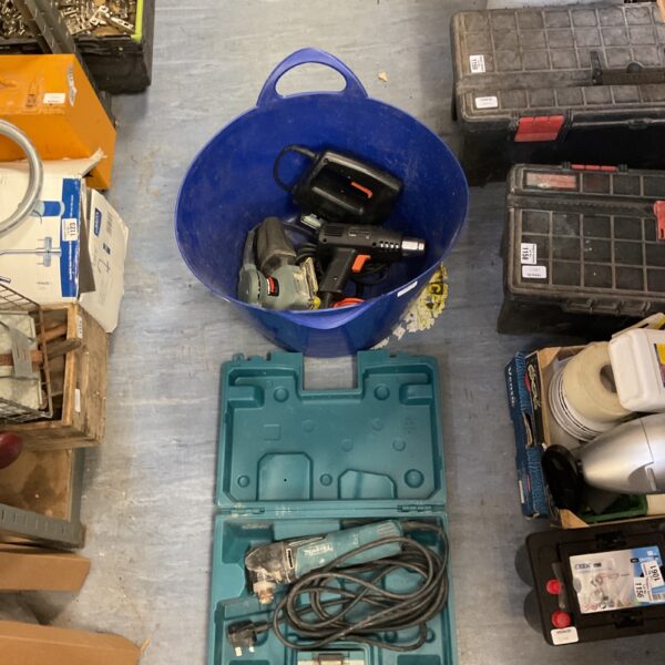 Power tool bundle including Black and Decker and Makita tools.