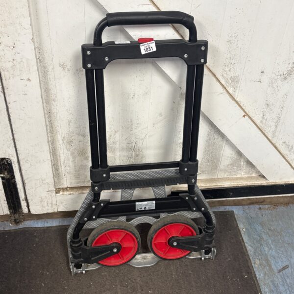 Red and black Powerfix folding sack barrow for moving items.