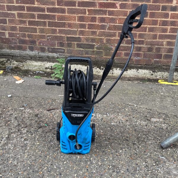 Blue pressure washer for garden and patio cleaning.