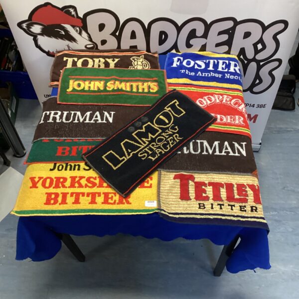 Vintage pub memorabilia lot featuring John Smiths branding.