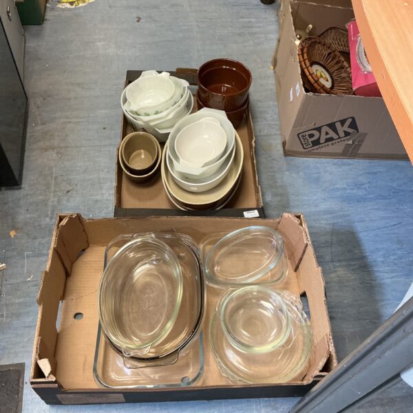 Vintage Pyrex ovenware lot with glass baking dishes and casserole dishes.