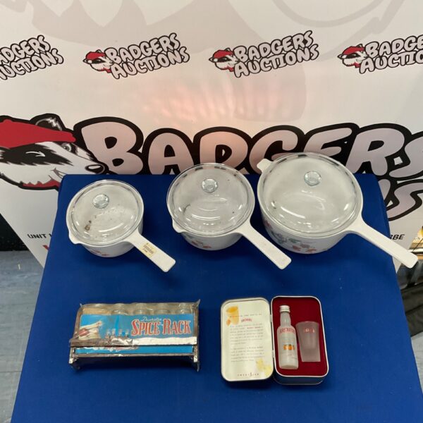 Vintage Pyrex kitchenware lot with spice rack and Archers Schnapps bottle.