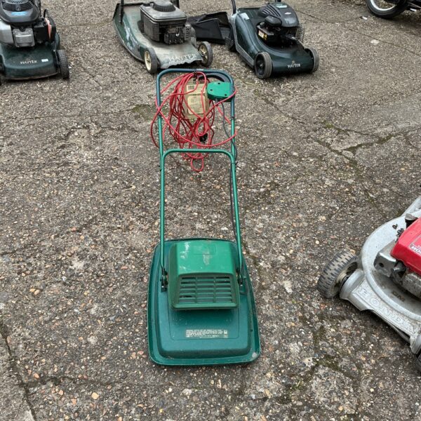 Vintage Qualcast electric lawnmower, a classic garden tool for lawn care.