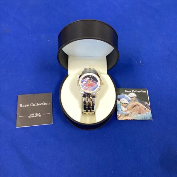 Silver Race Collection wristwatch with analogue display.