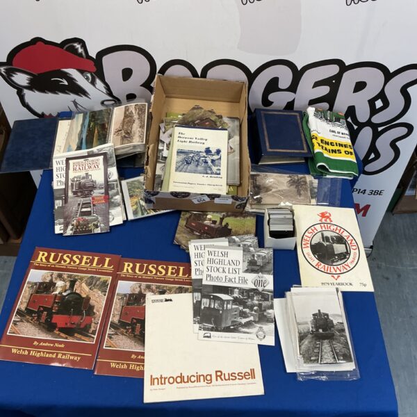 Vintage railway ephemera collection including postcards and photographs.